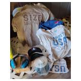 Garrett  1 pair under water headphones,  9 various shirts, 4 hats