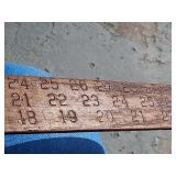 Rare Antique Lufkin Log Rule. Flexible Hickory log lumber stick measure. Lufkin Rule Co. Saginaw MICH  stamped on brass tip. The construction of the hand grip the rule is spit and a wedge is inserted 
