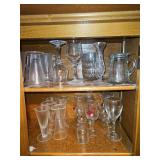 Contents of a few kitchen cabinet shelves containing an assortment of vintage and current glass & Plastic drinkware as well as some other items PLEASE SEE ALL PICS FOR DETAILS...