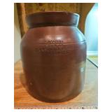 Vintage brown 7.25" tall advertising  stoneware crock with misspelled word "CONRER" NO LID in excellent vintage condition