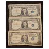 Three(3) Vintage Blue Seal $1 Silver Certificates 1957 & (2) 1957B Series in good/fair condition...