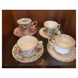 Four Fine Gold Accented Tea Cup and Saucers