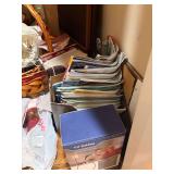 Assortment of Seasonal Decor, Magazines and Baskets