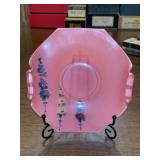 Vintage pink opalescent glass dish, likely from the early 20th century….. The specific pattern is sometimes called "Leaf Rays" and was produced by companies like Dugan and Diamond Glass-Ware Company