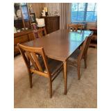 Great looking MCM Dining Table and (4) Chairs with microfiber-type fabric…..staining on some chair fabric