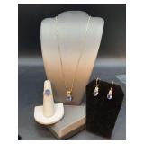 Exquisite 3- piece set of gold tone over sterling necklace, earrings and ring with tanzanite-like and clear stones…..Ring is size 5….total of 10 grams