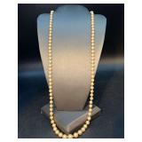 Beautiful vintage strand of pearls with clear stone clasp