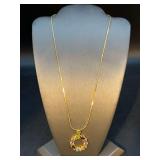Gorgeous gold tone chain with multi-colored wreath shaped pendant