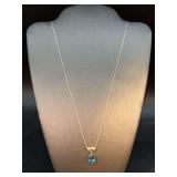 14K yellow gold delicate chain with 14K yellow gold London Blue Topaz Stone…..