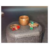 Grouping of (3) vintage rings…..none are marked but all 3 could possible be brass….the band on the red stone ring is broken…..wide band is marked Milford inside band