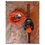 Black & Decker 22” hedge trimmer with extension cord (length unknown)