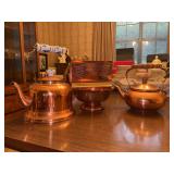 Grouping of various copper pieces…..(2) small tea kettles, napkin holder and planter