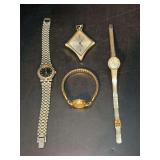 Great selection of ladies dressier watches….left is reproduction GUCCI, Timex, Saxony pendant watch and right is Jules Jurgenson