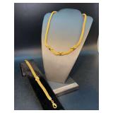 2-piece matching set…..gold tone mesh necklace and bracelet with infinity knots