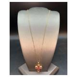 Delicate gold over sterling chain with heavily stoned reversible cross pendant