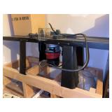 Router & Router Table…..BUYER RESPONSIBLE FOR REMOVAL FROM UPSTAIRS ATTIC….due to space limitations, could not get info about router…..does power up
