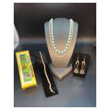 Miscellaneous pieces of costume/novelty jewelry…..Muppets watch, teal colored beaded necklace, dainty strand of pearls with sterling clasp/matching bracelet and unique guitar earrings