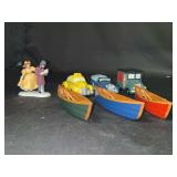 Grouping of Dept. 56 Heritage Village Collection handpainted porcelain accessory pieces in original boxes….Love or Money?, set of 3 automobiles and set of 3 wooden canoes