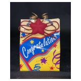 “Congratulations” musical gift bag from Music Box & Gift Co. in San Francisco…..3 x 3-3/4….in working condition….plays Put On A Happy Face