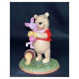 Pooh & Friends “A good friend sticks to you like honey” porcelain figure…..5-1/4” tall in original box