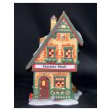 Dept. 56 Alpine Village Series “Käsenhändler Schmitt Cheese Shop” handpainted porcelain village piece in original box…..no cord for light
