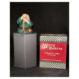 (2) Dept. 56 porcelain Merry Makers “Tolland the Toller Climbing Rope”…..2-1/4” tall and in original box…..both are bells….one box is sealed