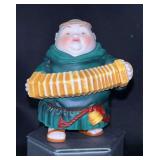 Dept. 56 porcelain Merry Makers Monks “Clarence the Concertinist”…..3-1/2” tall and in original box….small tear on box top