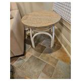 Metal based 24.25" round x 21.25" tall marble top side table...