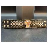 Black leather-like snap bracelet enhanced with multiple rhinestone accents and mirrored brass center