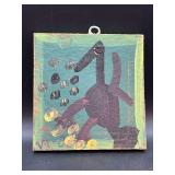 Authentic Signed Contemporary Artist Mose T Black Tico Bird with Yellow Toes Folk Art with signature soda can tab hanger…..6 x 6