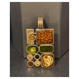 Art deco brass pendant with enameled accents and amber-colored stones