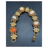 Beautiful gold tone decorative bracelet with multi-color cameo accents…..6”