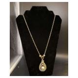 Silver tone western-look longer necklace with teardrop pendant and smoky gray/silver tone beaded accents