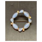 Very nice baby blue cat eye stone wreath shaped brooch with rhinestone accents
