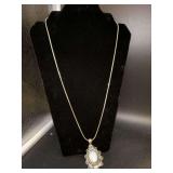Dress it up or down - nice looking silver tone snake chain with oval decorative pendant and Jadeite-like stone
