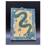 Authentic Signed Contemporary Artist Mose T Dark Teal Snake Folk Art with signature soda can tab hanger…..5–/4 x 6-3/4