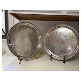 (2) Wm. Rogers round silver plate serving trays….both are very nice and measure 15”D x 1-1/4” tall