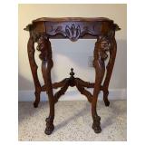 Victorian carved walnut parlor table with cabriole legs and a central finial….. 24-1/2 x 13 x 24 tall….slight blemished on top