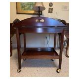 Nice looking cherry finish butler’s tray serving cart with casters…..27 x 17-3/4 x 31 tall with sides up