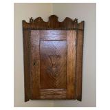 Vintage primitive oak hanging corner cabinet….does have key but lock needs reattached inside…..approx. 27” tall