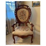 Beautifully carved rosewood parlor chair with floral tapestry seating and back…..27-1/2 x 24 x 49 tall overall