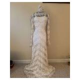 Gorgeous antique wedding gown on full body form