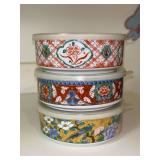 Set of (3) ceramic serving bowls with plastic lids…..6-1/4”D x 2-1/2” tall