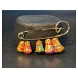 Adorable and uniquely designed nesting doll brooch