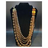Nice look multi-strand amber-tone necklace