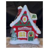 Adorable Hallmark Santa’s Workshop with lights and sounds…..first in the North Pole Village Collector Series….in working condition