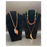 (3) costume necklaces…..left is multi/strand with art glass pendant by Erica