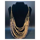 Multi-strand wood bead necklace in earth-tone colors