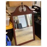 Beautiful cherry finish wall mirror…..23-1/2 x 39” tall