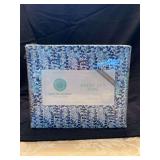 Nice assortment of linens (new and used) tablecloths and King size sheet sets (one is Martha Stewart)￼l